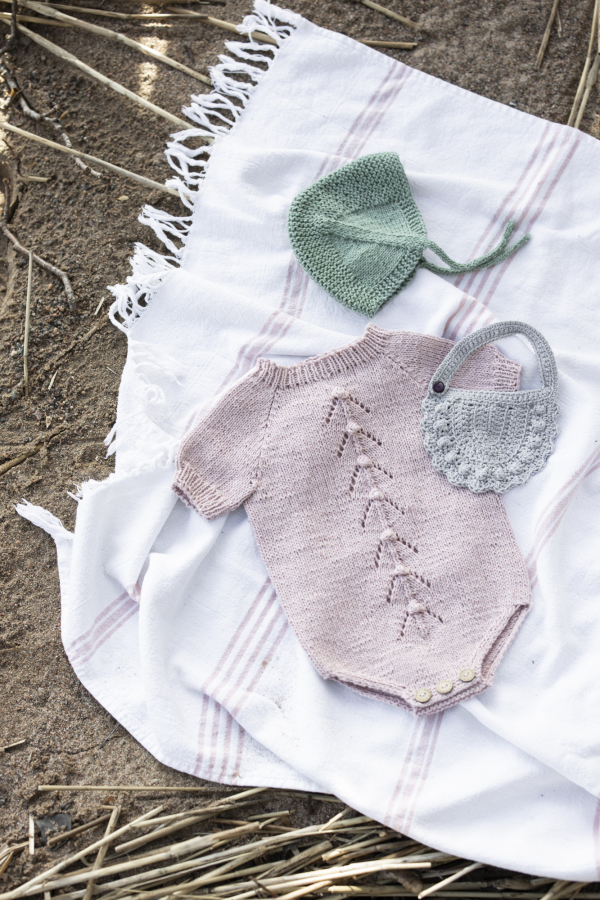 Free Knitting Pattern for a Rosebud Baby Body Suit and Bonnet
